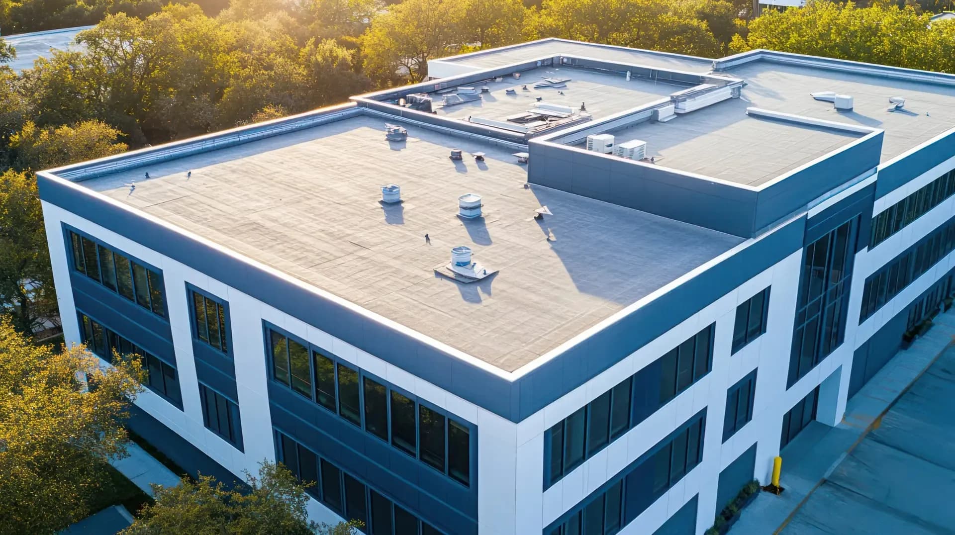 Aerial view of a flat roof on a commercial office building