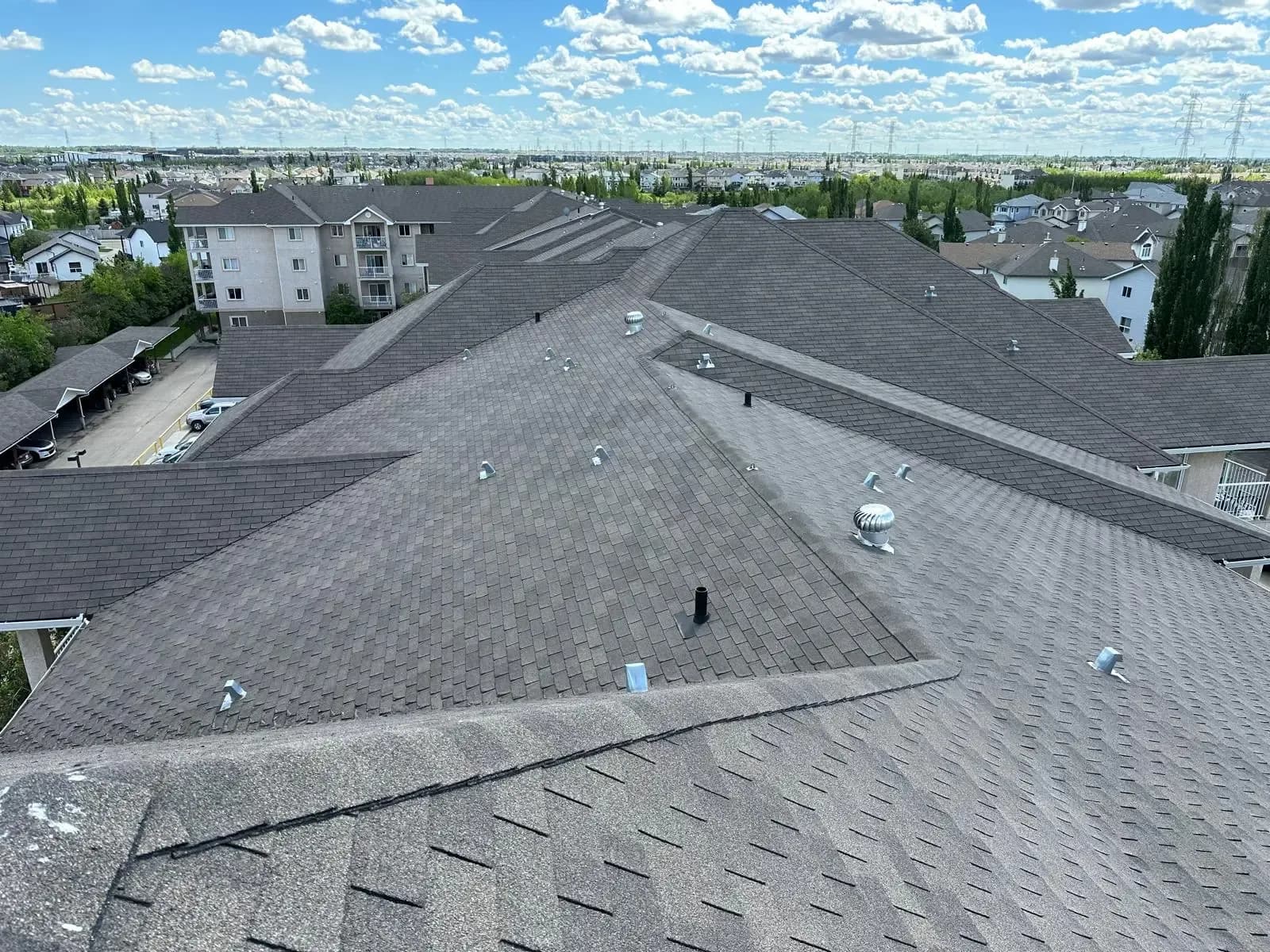 New grey shingle roof overlooking an Edmonton neighbourhood